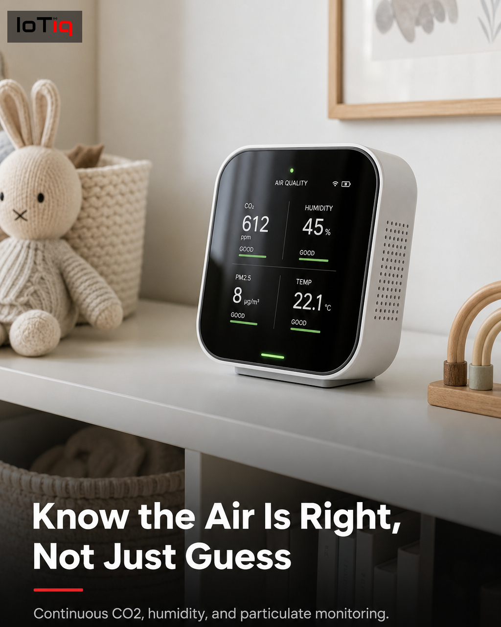 A small air quality sensor placed on a nursery shelf, tracking CO2 and humidity.