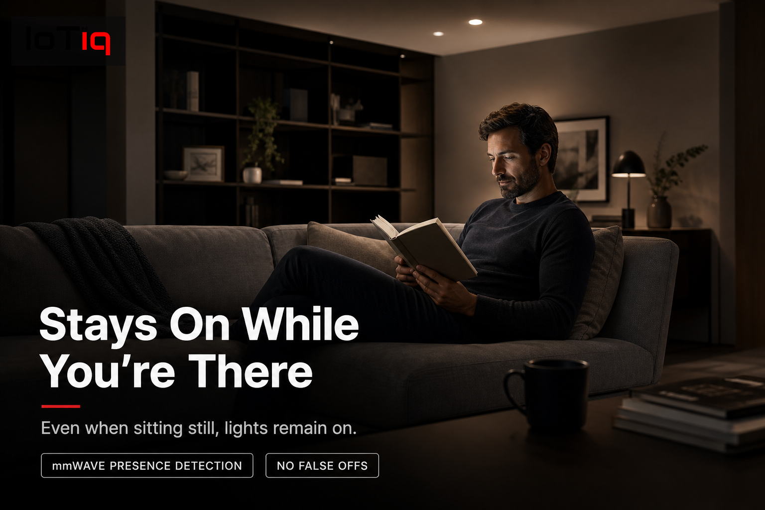 Living room with motion-activated lights staying on while a person reads on the couch.