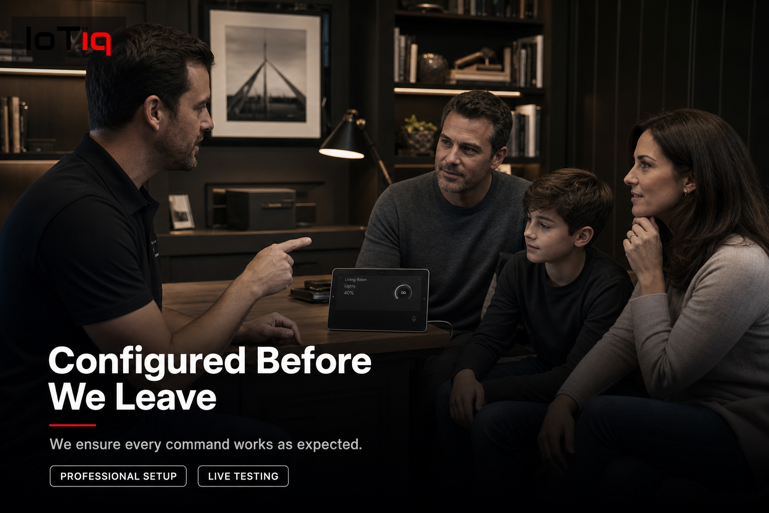 Professional installer demonstrating voice control to a family in a home office